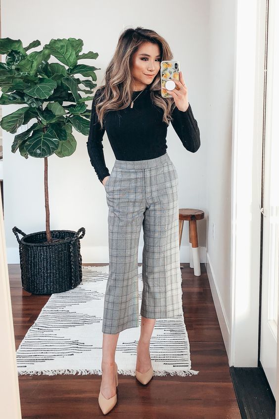 a casual look with a black jumper, plaid grey culottes and nude shoes will be actual for both work and a date