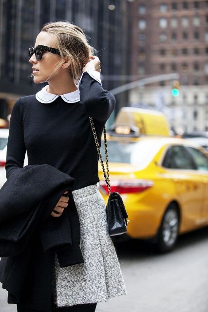 With black and white shirt, gray tweed mini skirt and black coat