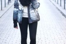 With black pants, white t-shirt, printed puffer jacket and black high heeled boots
