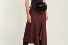 With black turtleneck, printed midi skirt and black boots