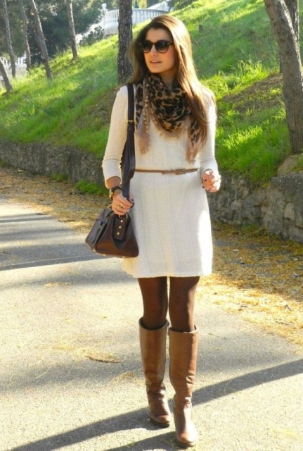 With brown high boots, leopard scarf and bag