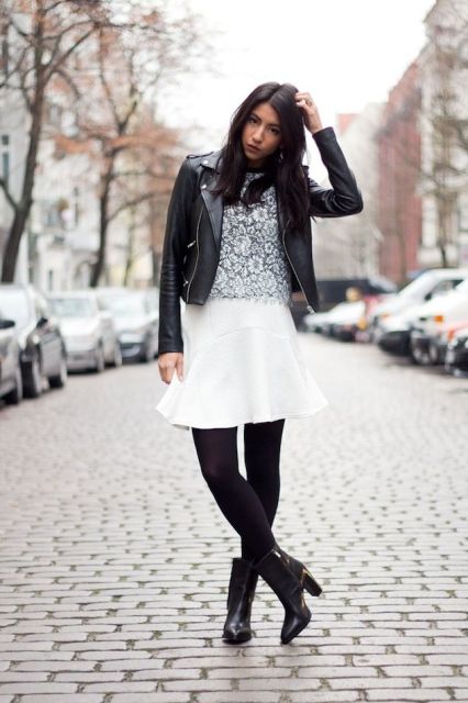 With floral shirt, black leather jacket, black tights and ankle boots