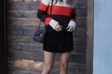 With gray and black hat, black mini skirt, mini bag and patent leather boots