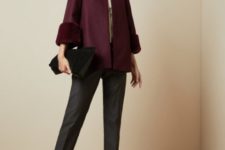 With gray cropped trousers, black ankle boots, black clutch and beige shirt