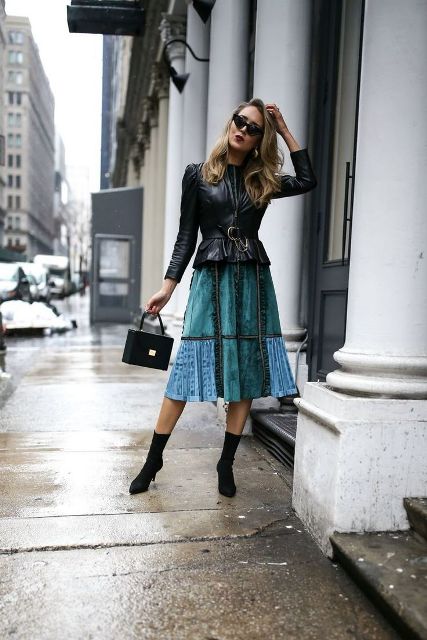 With patchwork midi skirt, black bag and black sock boots