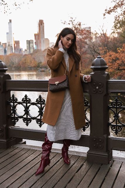 With printed midi dress, patent leather high boots and brown coat