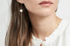 a delicate mono earring of a chain and a pearl on it is a gorgeous idea to go for