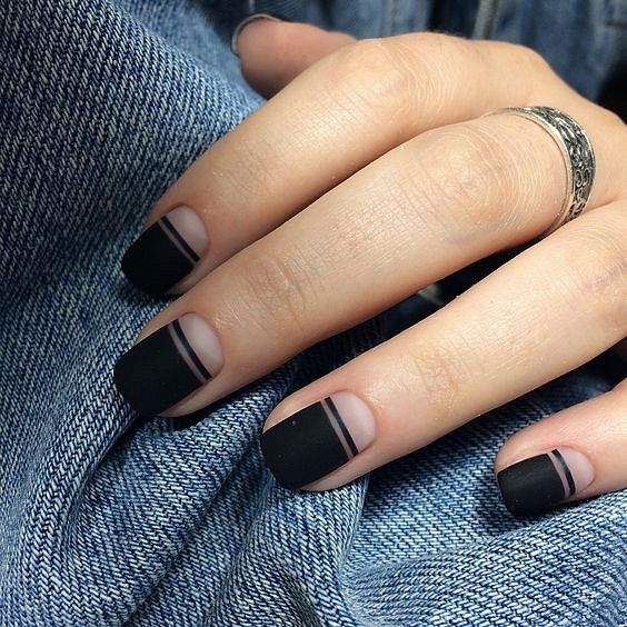 a matte black and nude manicure with stripes is a chic minimalist idea to go for