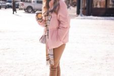 a pink puff jacket, a plaid scarf, tan jeans and beige hiking boots for a glam winter look