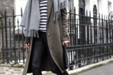 a striped top, black leather pants, black trainers, an olive green coat and a grey scarf for every day
