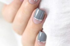 a stylish modern nude and grey manicure with silver stripes is ideal for a minimalist look