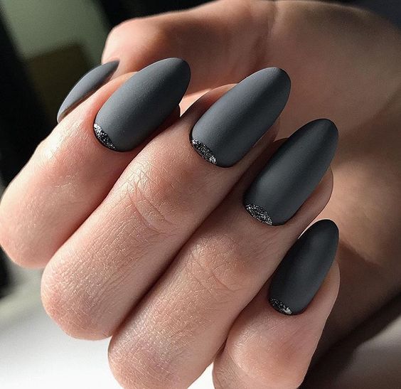 matte graphite grey nails with touches of black glitter look amazing and very bold