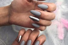 matte grey nails with accent silver glitter nails are amazing for winter holidays, they feel like winter