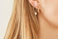 02 a trio of hoop earrings – a chunky one, an embellished one and a pearl one plus a matching hoop piercing