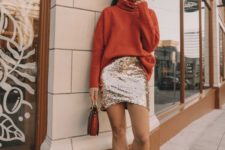 04 an oversized rust sweater, a silver sequin mini, silver ankle strap shoes and a bold bag plus statement earrings