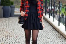 With black mini dress, black scarf, black bag and ankle boots