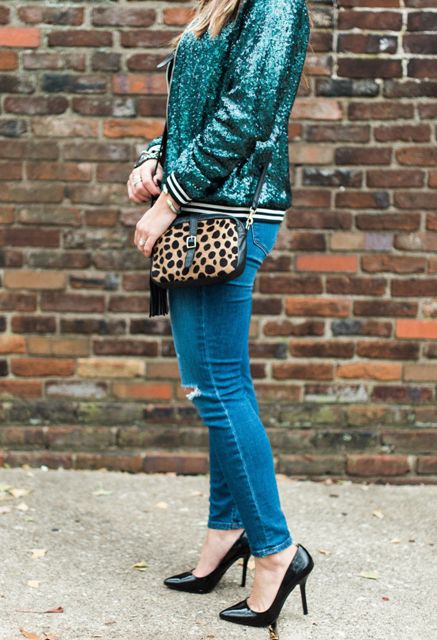 With jeans, black shoes and leopard bag
