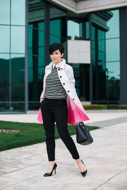 With striped shirt, black pants, black shoes and leather bag