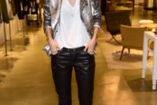 With white loose t-shirt, leather pants and beige pumps
