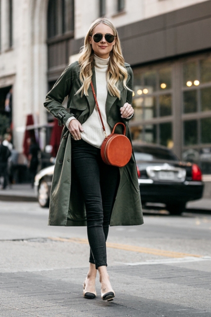 With white turtleneck, black cropped pants, midi trench coat and two colored shoes
