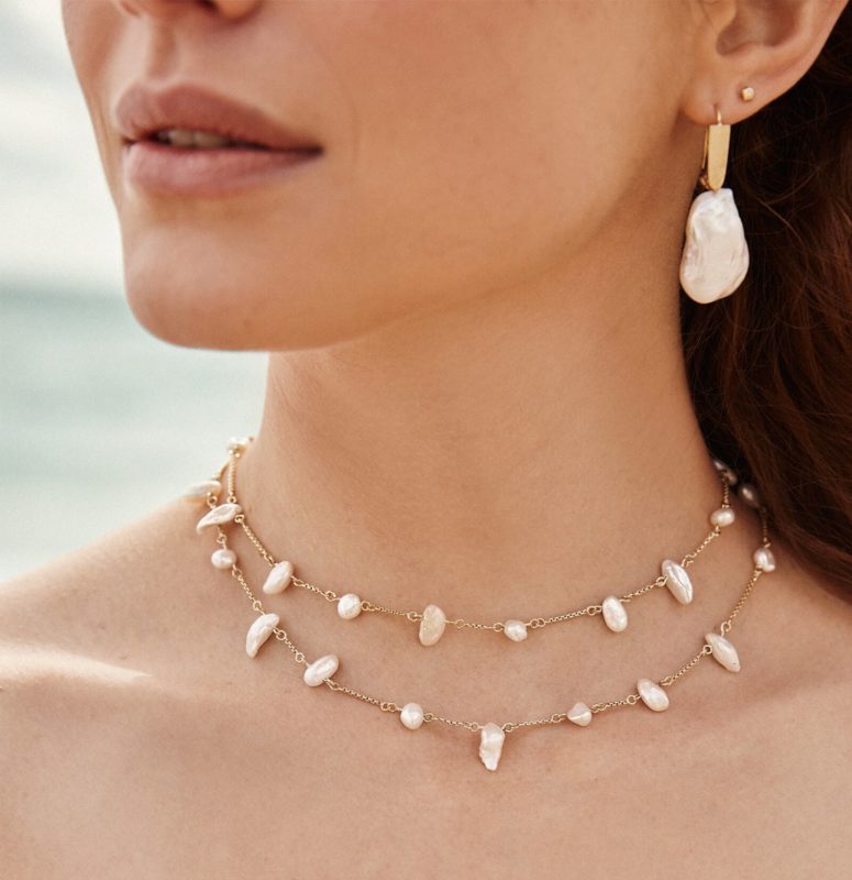 a combo of a two tier baroque pearl necklace plus a matching mono earring for a bold modern look