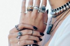 a fancy boho ring setup with various shapes, rhinestones, metals and finishes for a free-spirited person