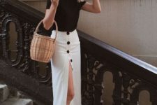 a monochromatic look with a black tee, a white pencil skirt with blakc buttons and a slit, black buckle shoes and a basket
