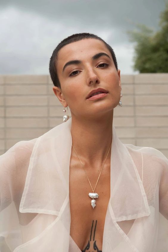 a statement baroque pearl necklace and matching earrings for a super refined and chic accent with a modern feel