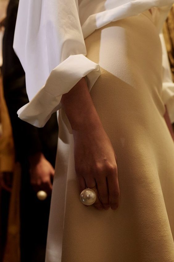 an oversized pearl ring is such a statement accessory that you won't need any other jewelry at all