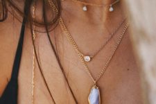 stacked gold necklaces with moonstones and agates look very free-spirited and very chic