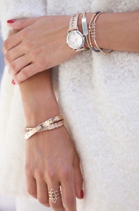 stacked rose gold bracelets with pretty textures and shapes and a matching watch on a blush cutout leather strap