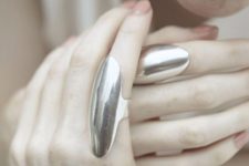 statement silver rings with polished surfaces is a gorgeous idea to accent your look and make it trendy