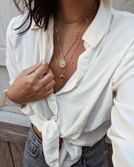 three necklaces   a chunky chain choker, two delicate chains with pendants for a cool boho look