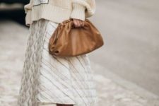 03 such a small and cute brown leather soft clutch will accommodate a lot of things