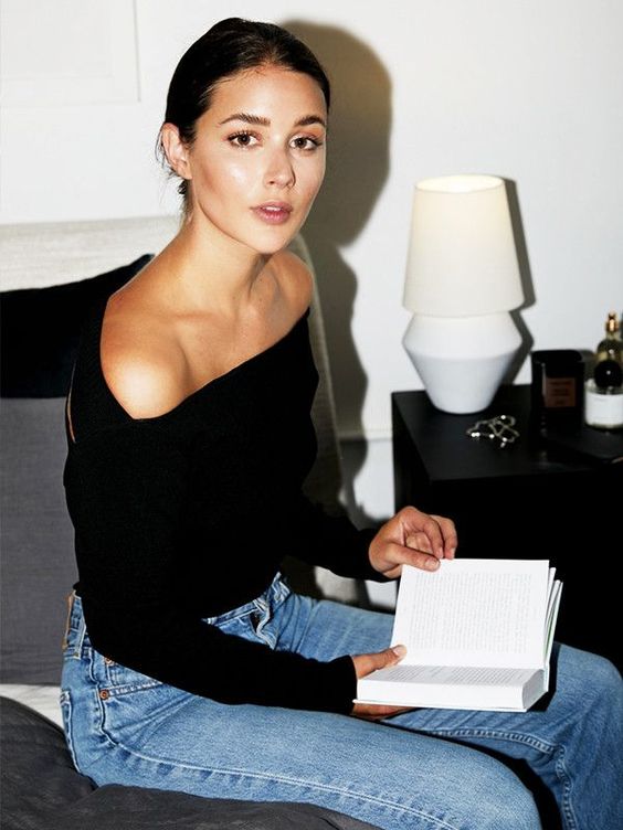 a black off the shoulder top, blue jeans for a simple casual yet very sexy look