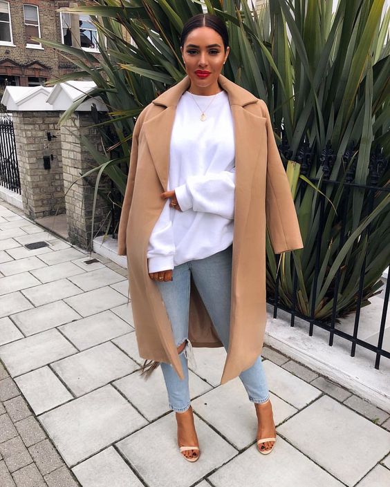 pair an oversized sweatshirt with ripped skinnies, heels and a classic camel coat