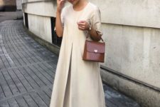 12 a comfortable ivory A-line minimalist midi dress, burgundy slippers and a matching bag