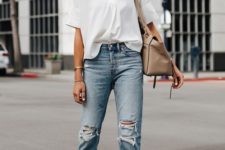 12 a white oversized shirt, light blue ripped boyfriends, white slipper mules and a taupe bag