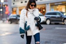 With long sweater, ombre fur jacket, distressed jeans, black boots and chain strap bag