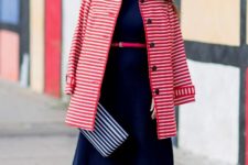 With navy blue midi dress, striped clutch, red belt and polka dot shoes