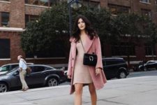With pale pink mini dress, black chain strap bag and pink coat