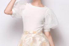 With pastel colored floral A-line skirt