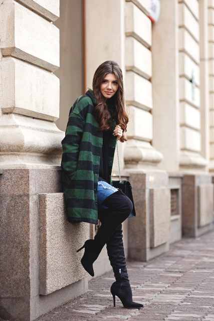 With skinny jeans, black bag and black over the knee boots