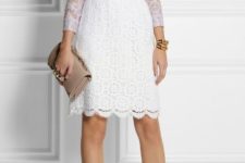 With white lace knee-length skirt, beige clutch and white pumps