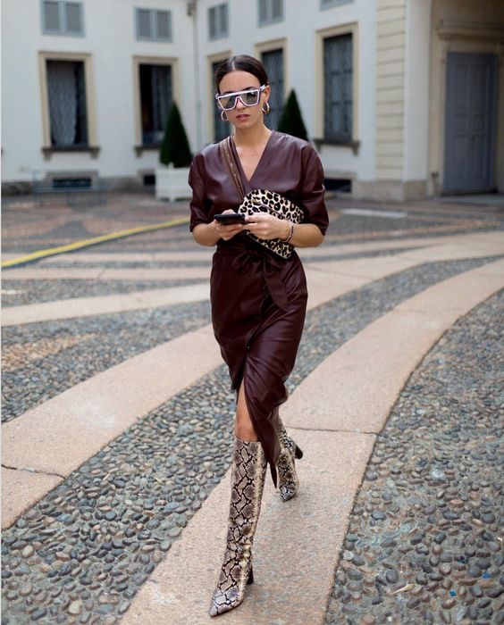 a burgundy wrap midi dress with long sleeves, an animal print bag and snakeskin print boots