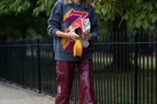 a grey sweater with colorful prints, burgundy leather culottes and leopard print shoes