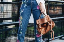 a white oversized shirt, blue embroidered jeans, brown booties and a bag for the fall