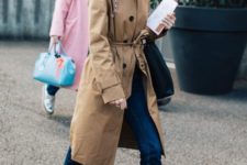 02 straight navy jeans, white high tops, a camel trench and a large bag for a spring outfit