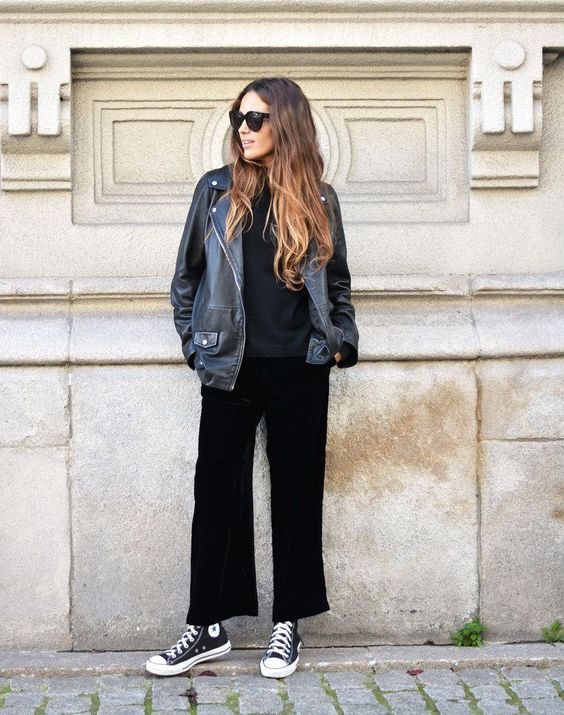 a total black look with a top, culottes, Converse high tops and a black leather jacket for spring