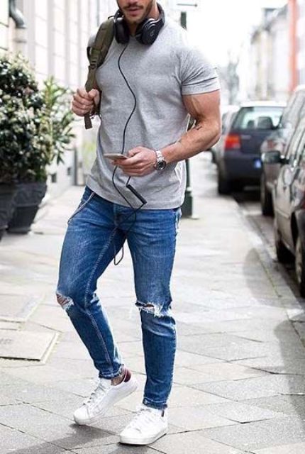 a comfy spring look with a grey tee, blue ripped skinnies, white sneakers is classics